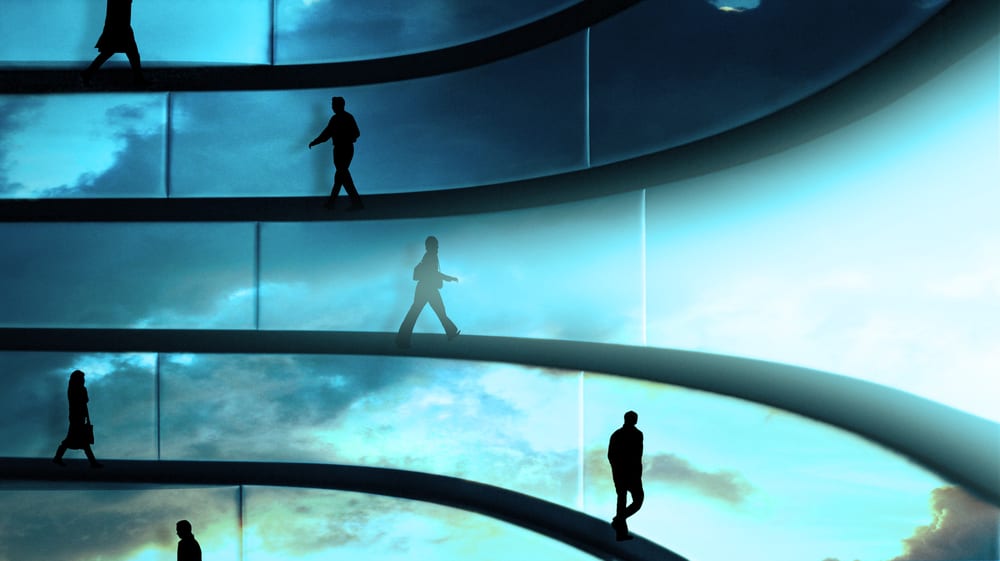 walking people in front of blue area sky light futuristic building automation